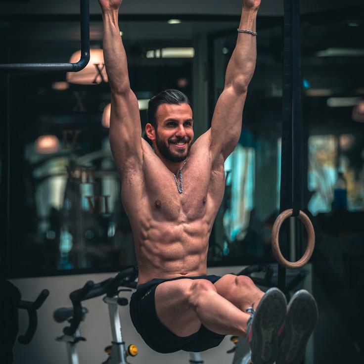 Interior of a professional gym with weight training equipment and mirrors